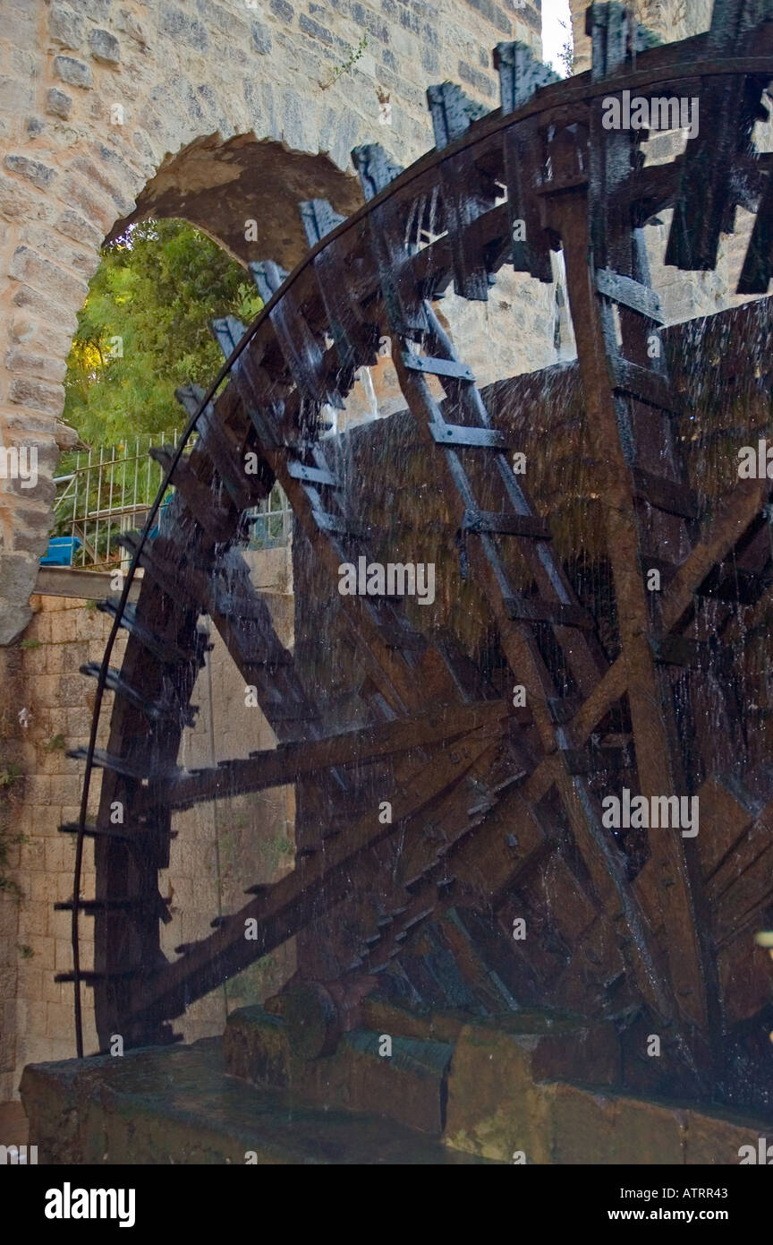 Giant wooden water wheel Noria on the Orontes River Hama Syria