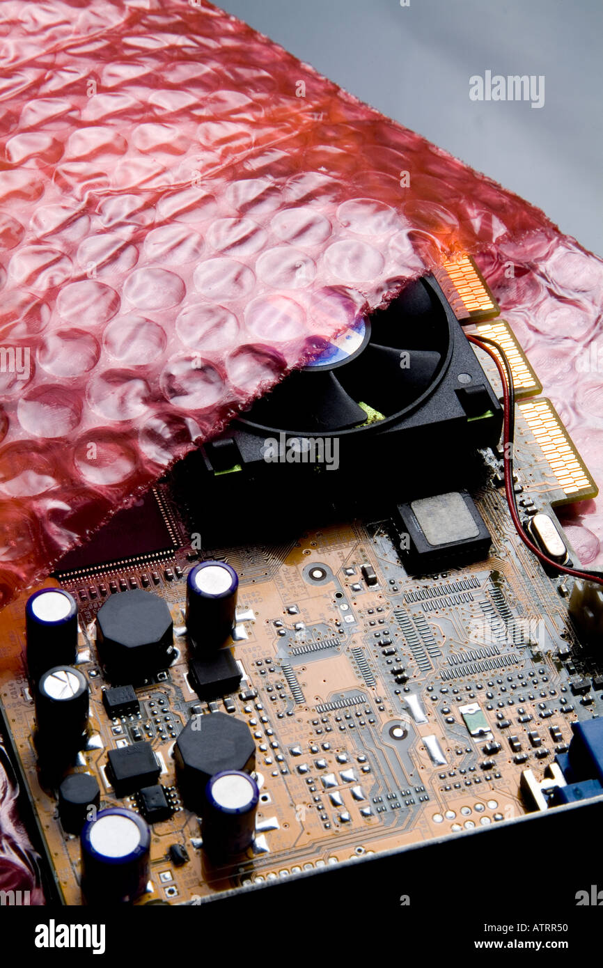 Computer peripheral circuit board card on plastic bubble wrap Stock Photo
