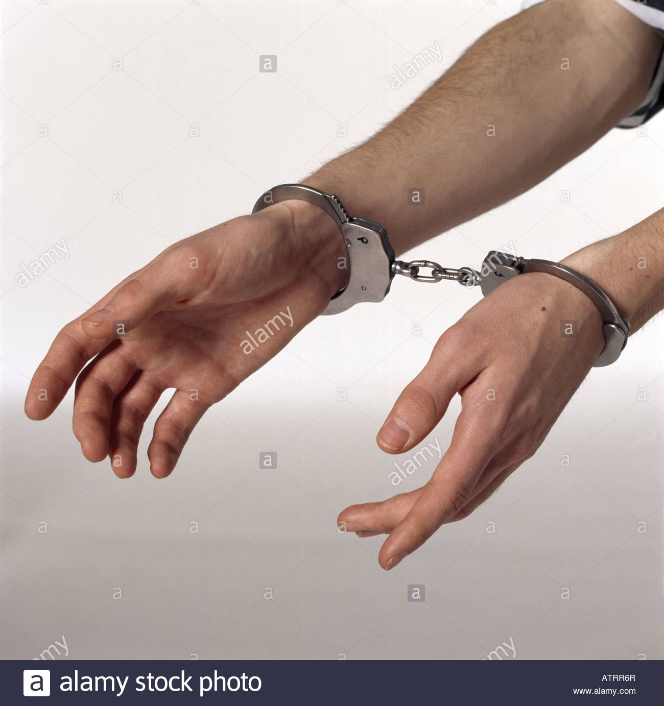 Wrists Handcuffs High Resolution Stock Photography and Images Alamy