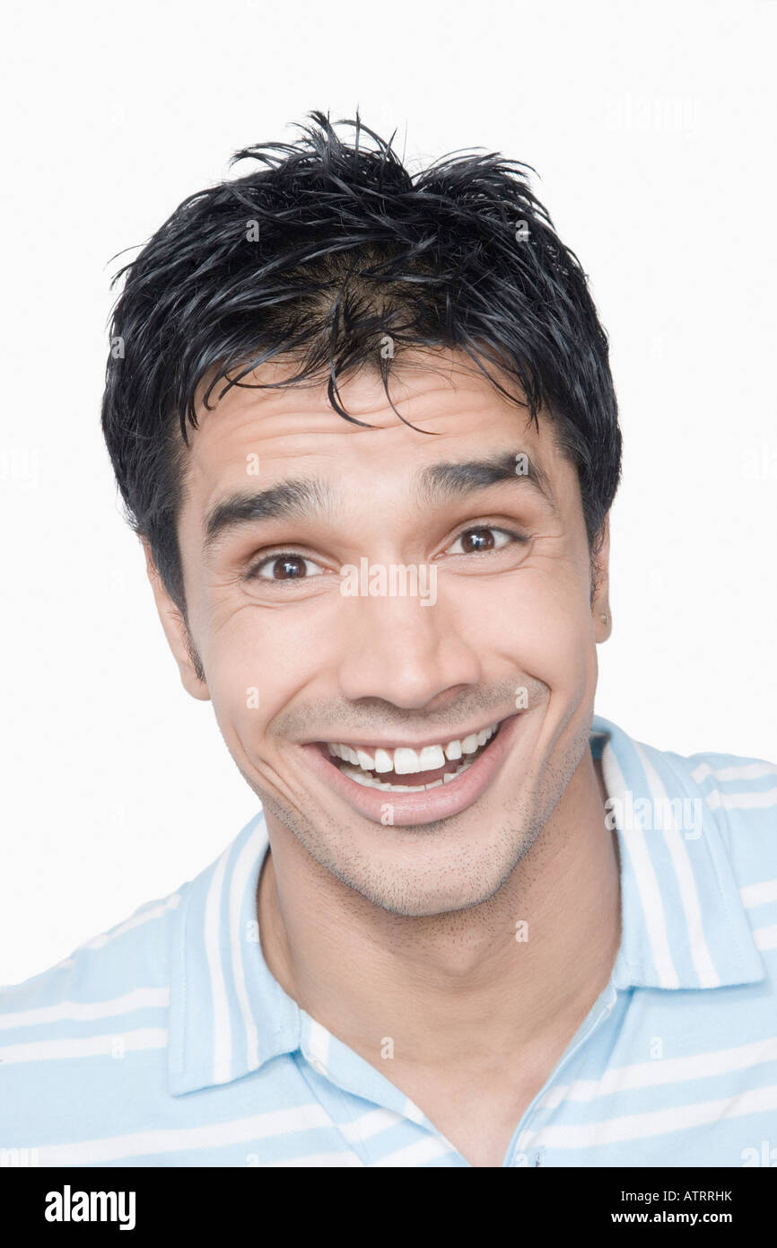 Portrait of a young man smiling Stock Photo - Alamy