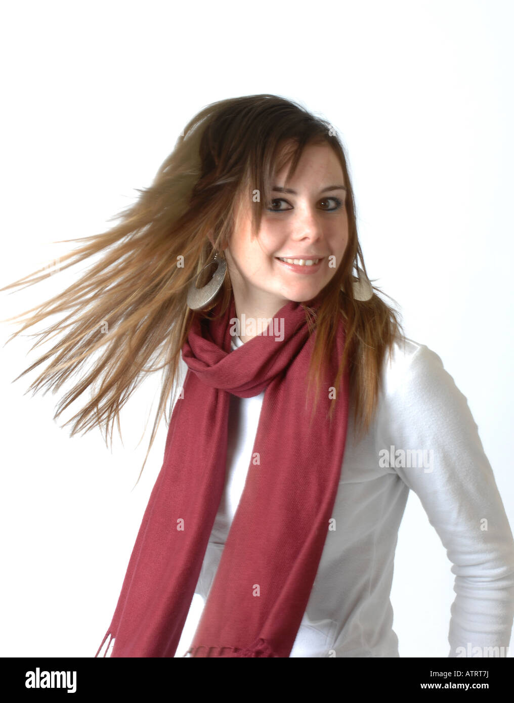 A generic photograph of a teenage girl shaking her hair Stock Photo