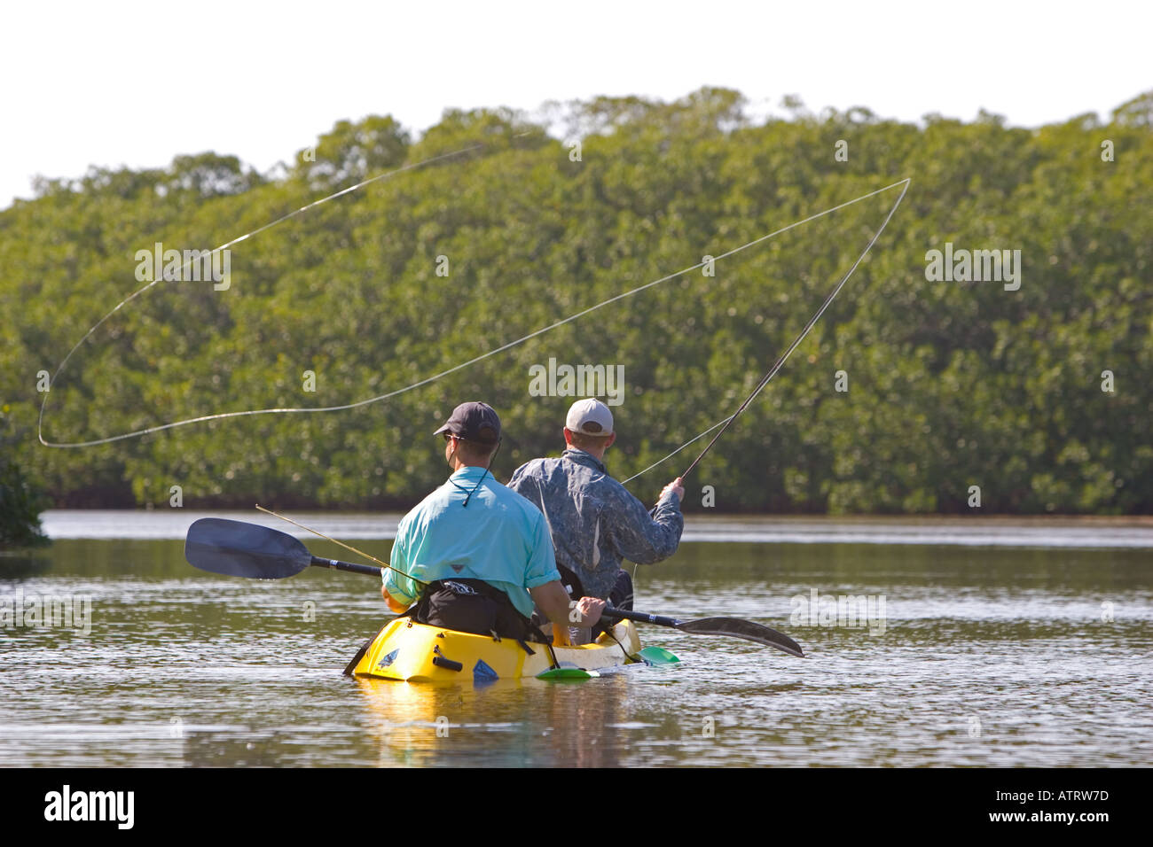 Fly fishing from a kayak Florida Stock Photo Alamy