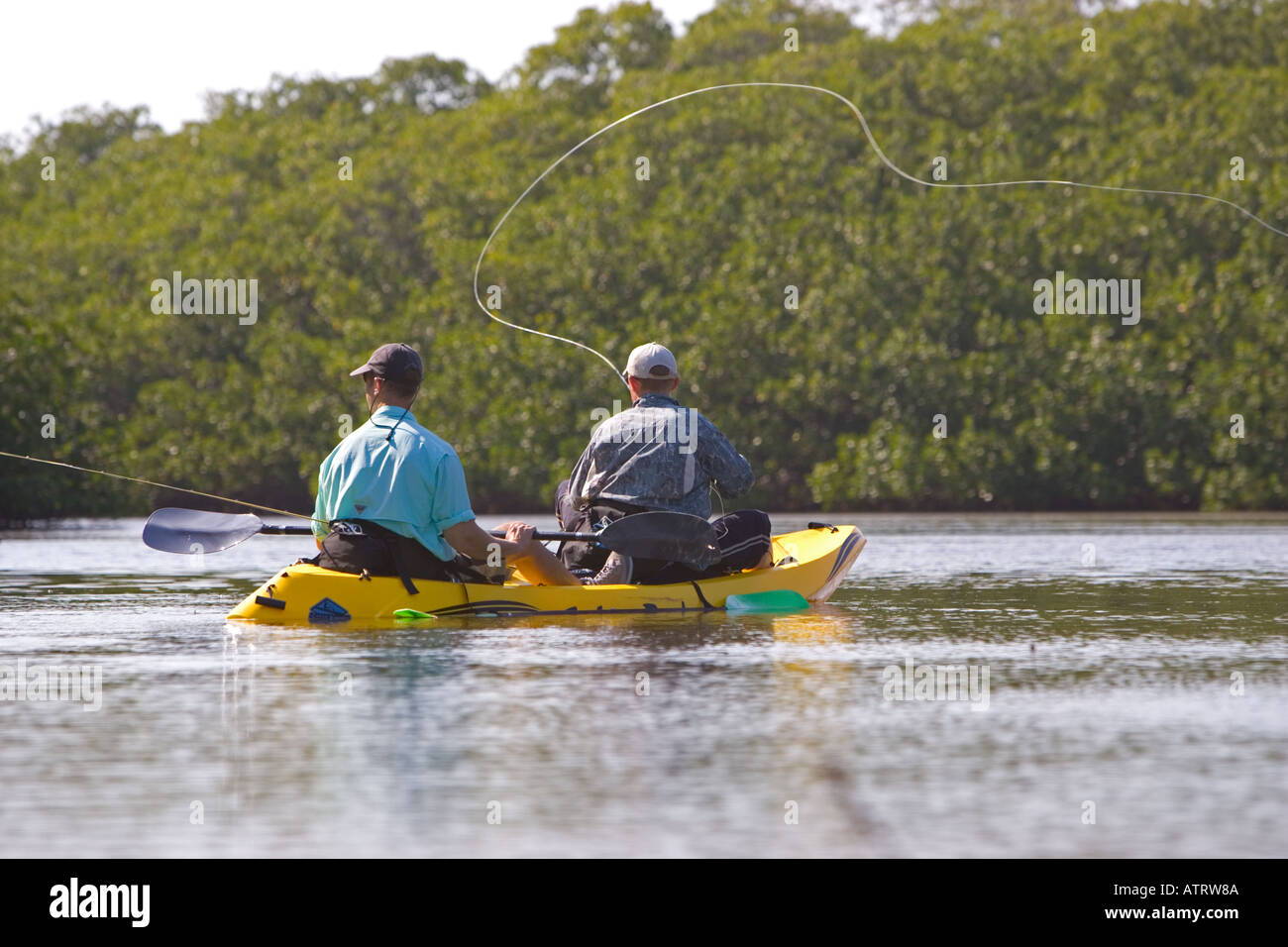 Fly fishing from a kayak Florida Stock Photo Alamy