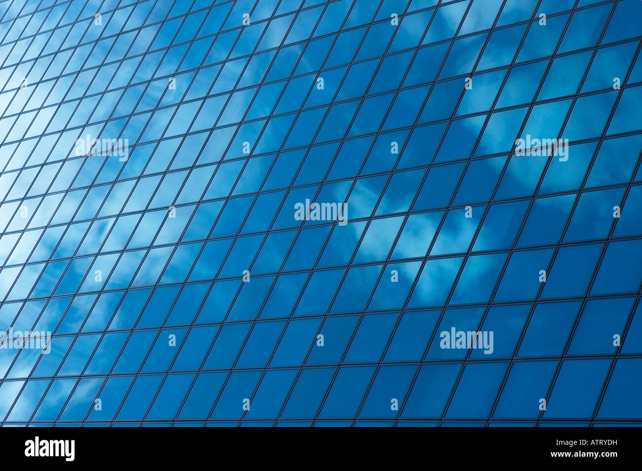 sky reflecting in windows of office building Stock Photo - Alamy