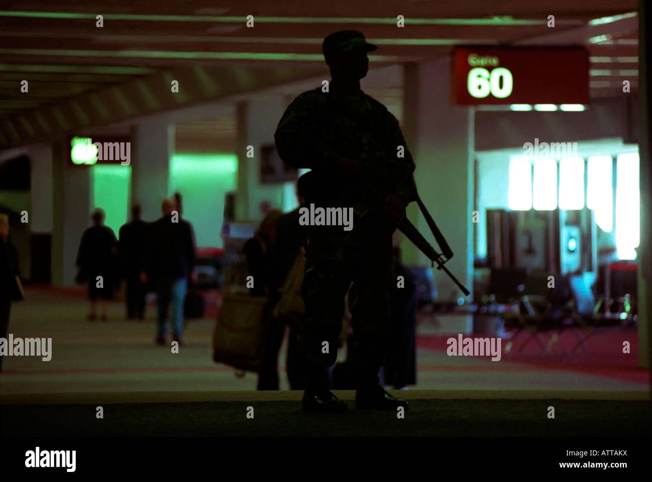 A California National Guard Soldier with an M16 Rifle stands at the concourse entrance at San Francisco International Airport. Stock Photo