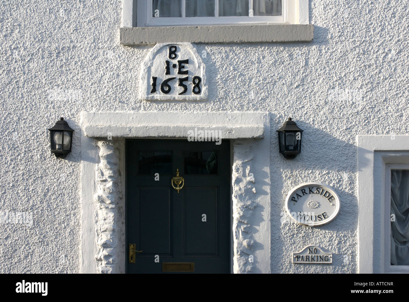 1658 datestone on house in Cartmel, Cumbria UK Stock Photo