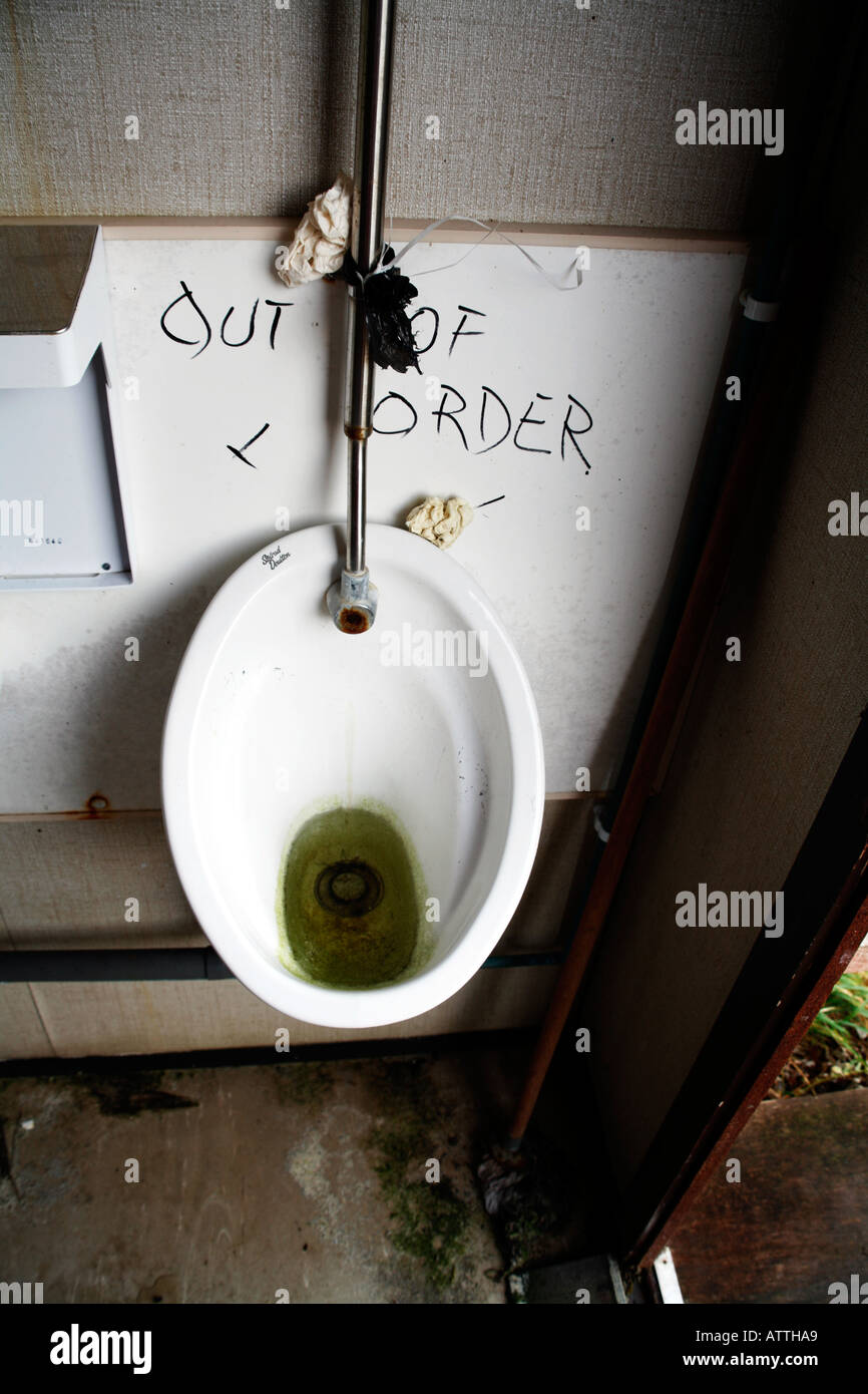 Out of Order Urinal Stock Photo - Alamy