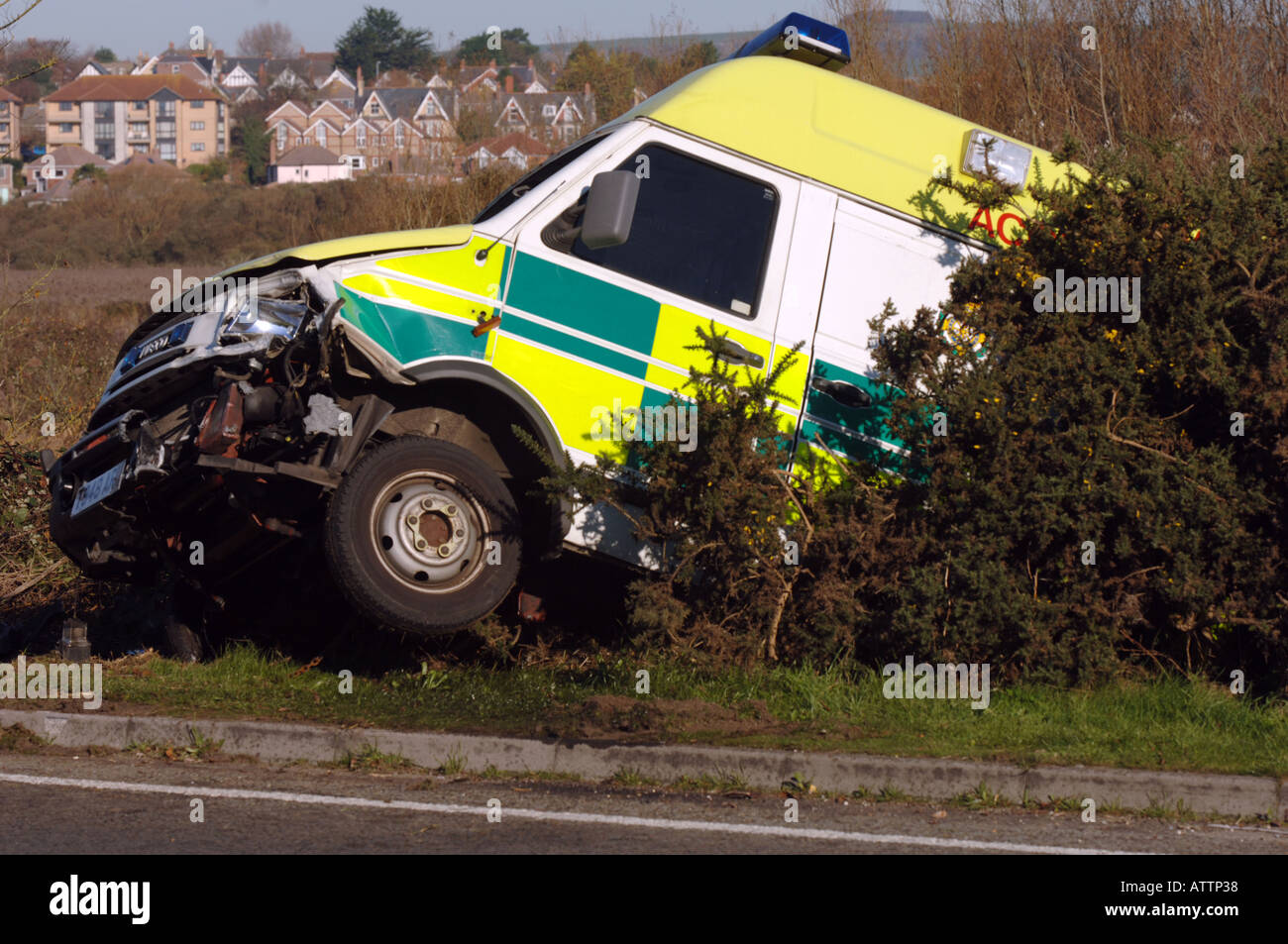An ambulance that has crashed on the way to an emergency Stock Photo