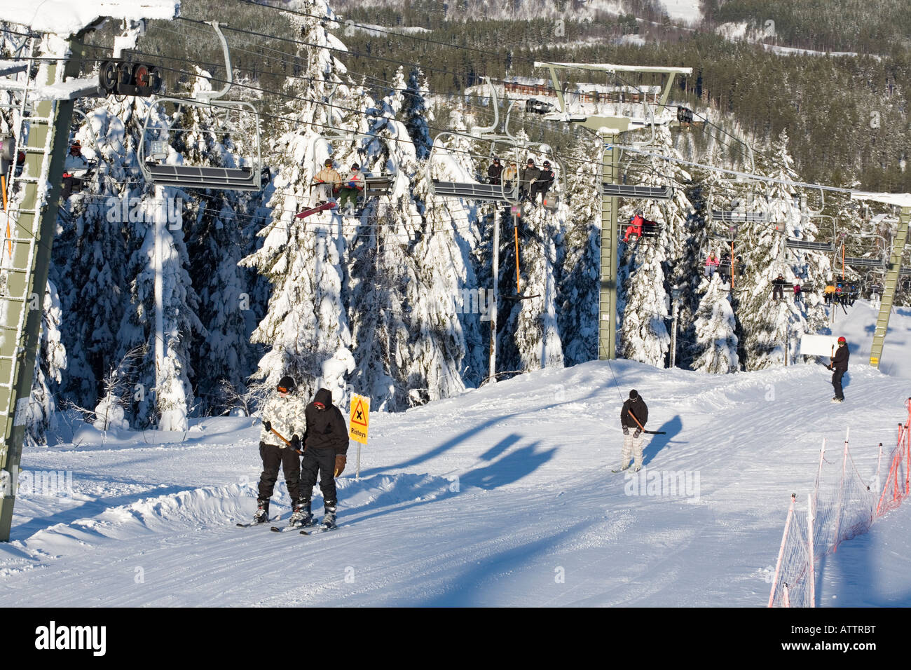 skiers in skilift at the Vuokatti ski resort Sotkamo Finland Stock Photo