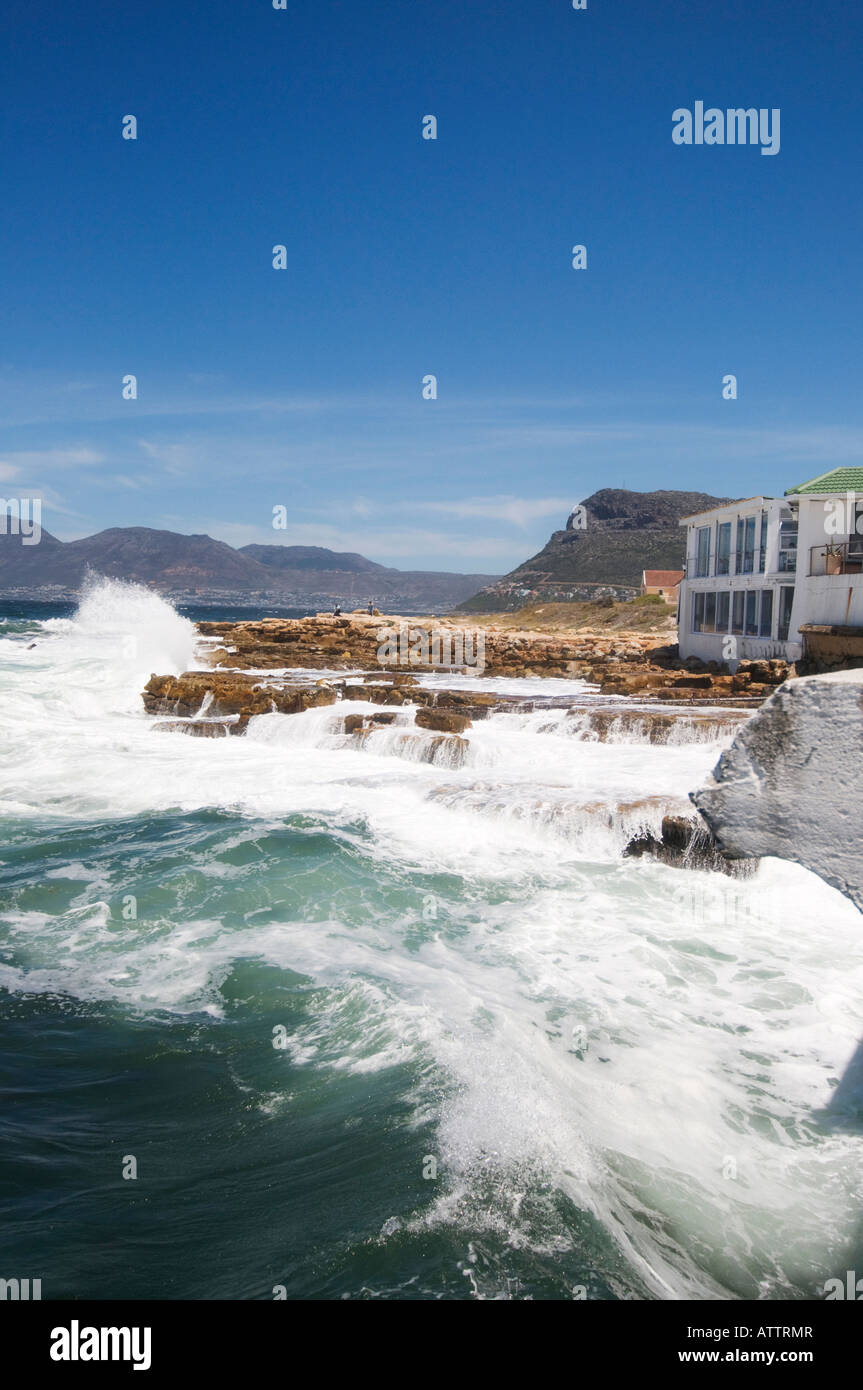 Fish Hoek harbour with crashing waves on the False Bay coast of Cape Peninusula near Cape Town South Africa Stock Photo