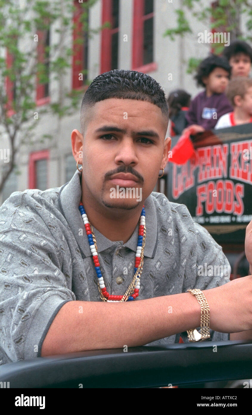Mexican American Latino man age 23 looking serious at Cinco de Mayo festival. St Paul Minnesota USA Stock Photo