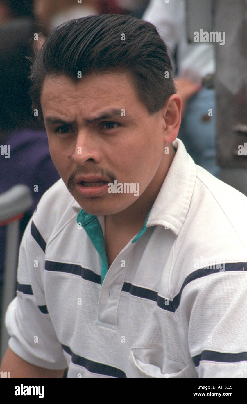 Hispanic man age 30 looking worried at Cinco de Mayo festival. St Paul Minnesota USA Stock Photo