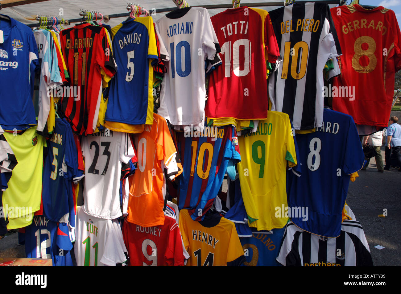 Football shirts for sale on a market stall Stock Photo - Alamy