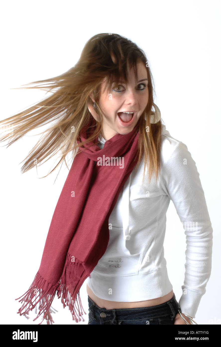 A generic photograph of a teenage girl shaking her hair Stock Photo