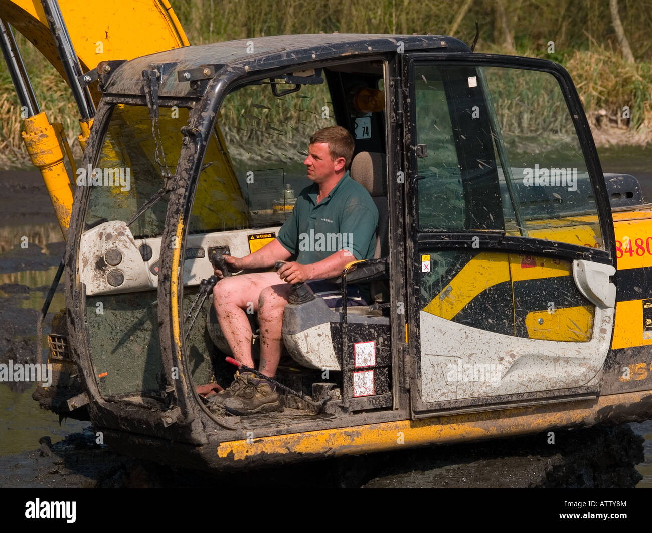 [digger driver] and cab Stock Photo Alamy