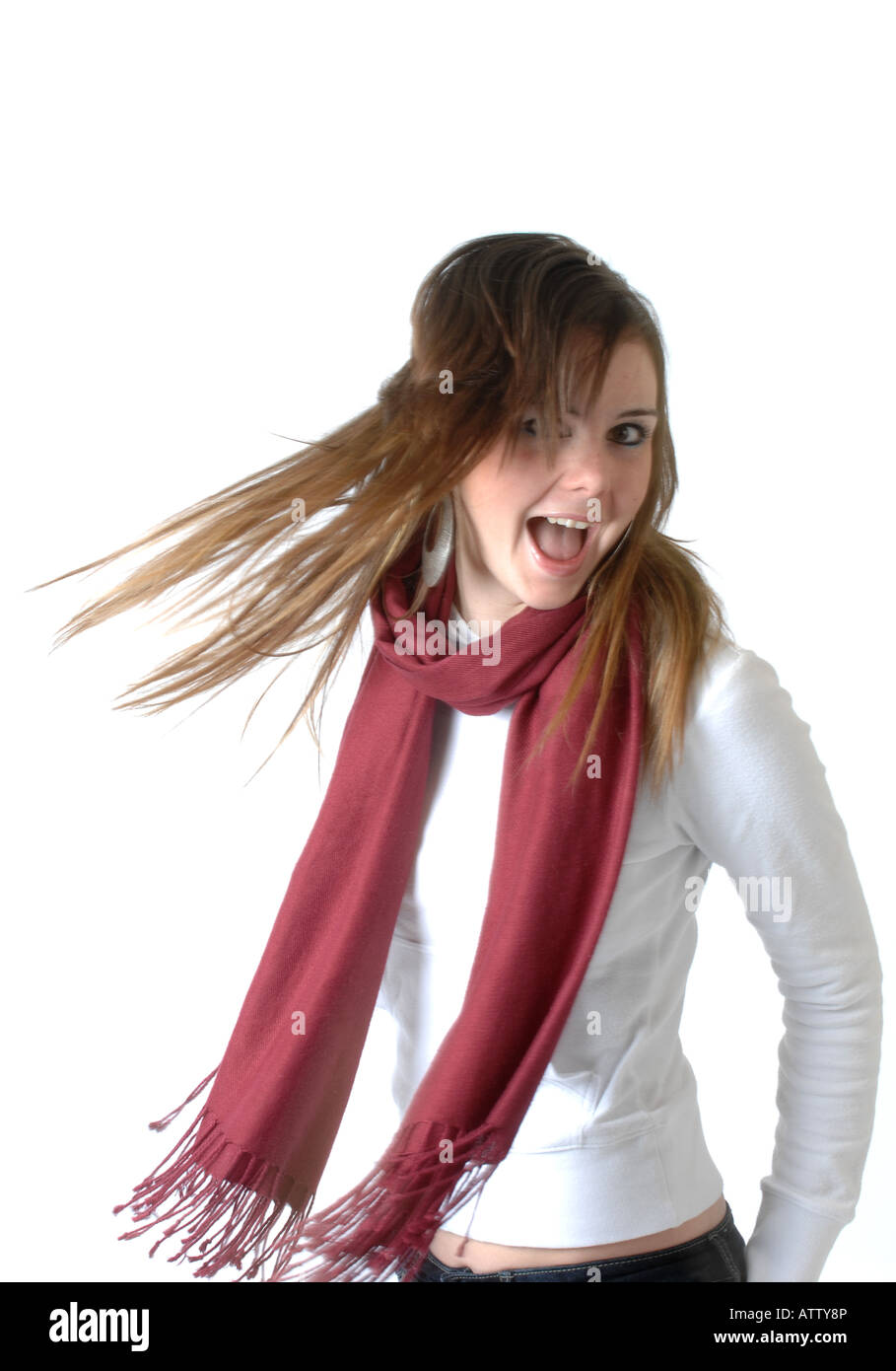 A generic photograph of a teenage girl shaking her hair Stock Photo