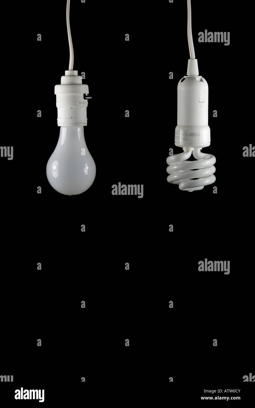 Incandescent and compact fluorescent lightbulbs CFL side by side Stock Photo