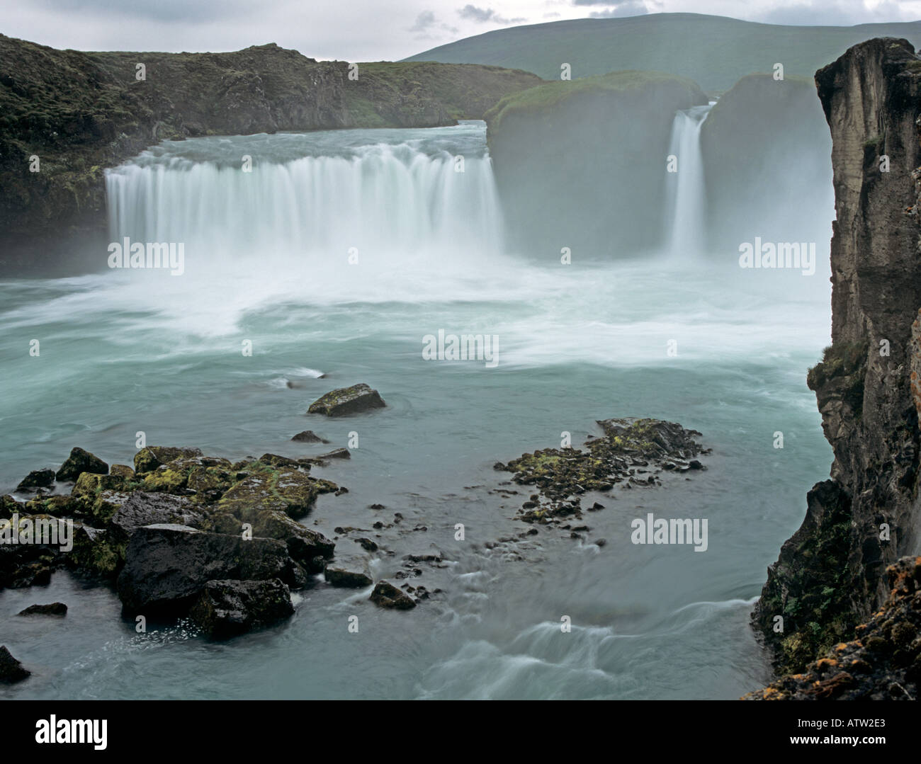 GODAFOSS ICELAND EUROPE July Mighty horseshoe falls throw spray high in the air visible from the approach road Stock Photo