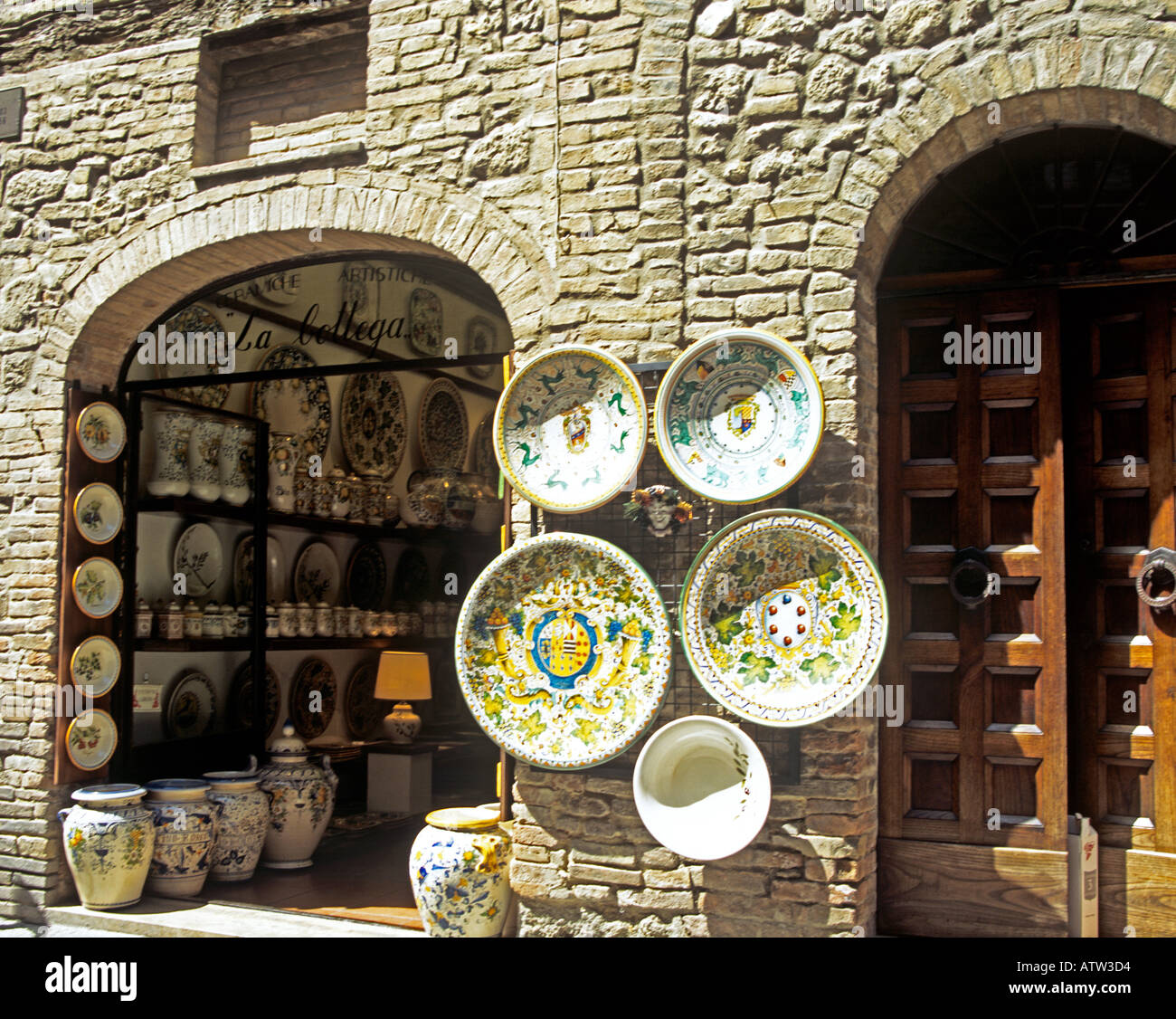 SAN GIMIGNANO TUSCANY ITALY EUROPE May Artistic ceramics in Via San Giovanni in this lovely town Stock Photo