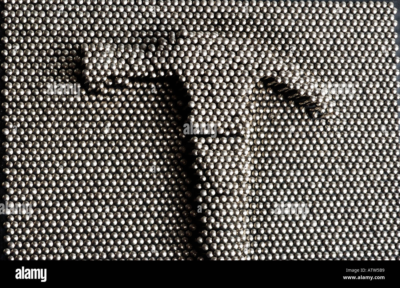 Pin Matrix with claw hammer imprint Stock Photo