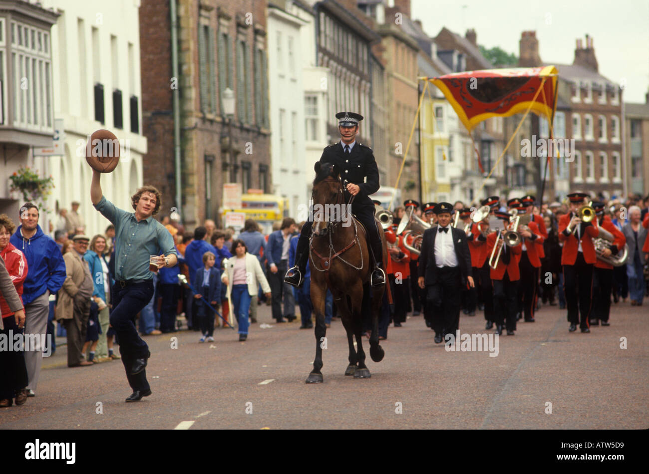 Durham Coal Miners Gala County Durham  England. Miner with pint of beer dances in the street 1980s 1981 HOMER SYKES Stock Photo
