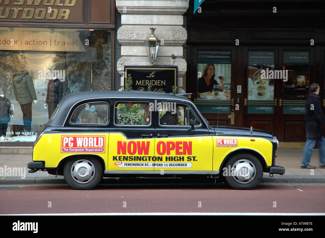 London Black Cab with advertising slogan Stock Photo