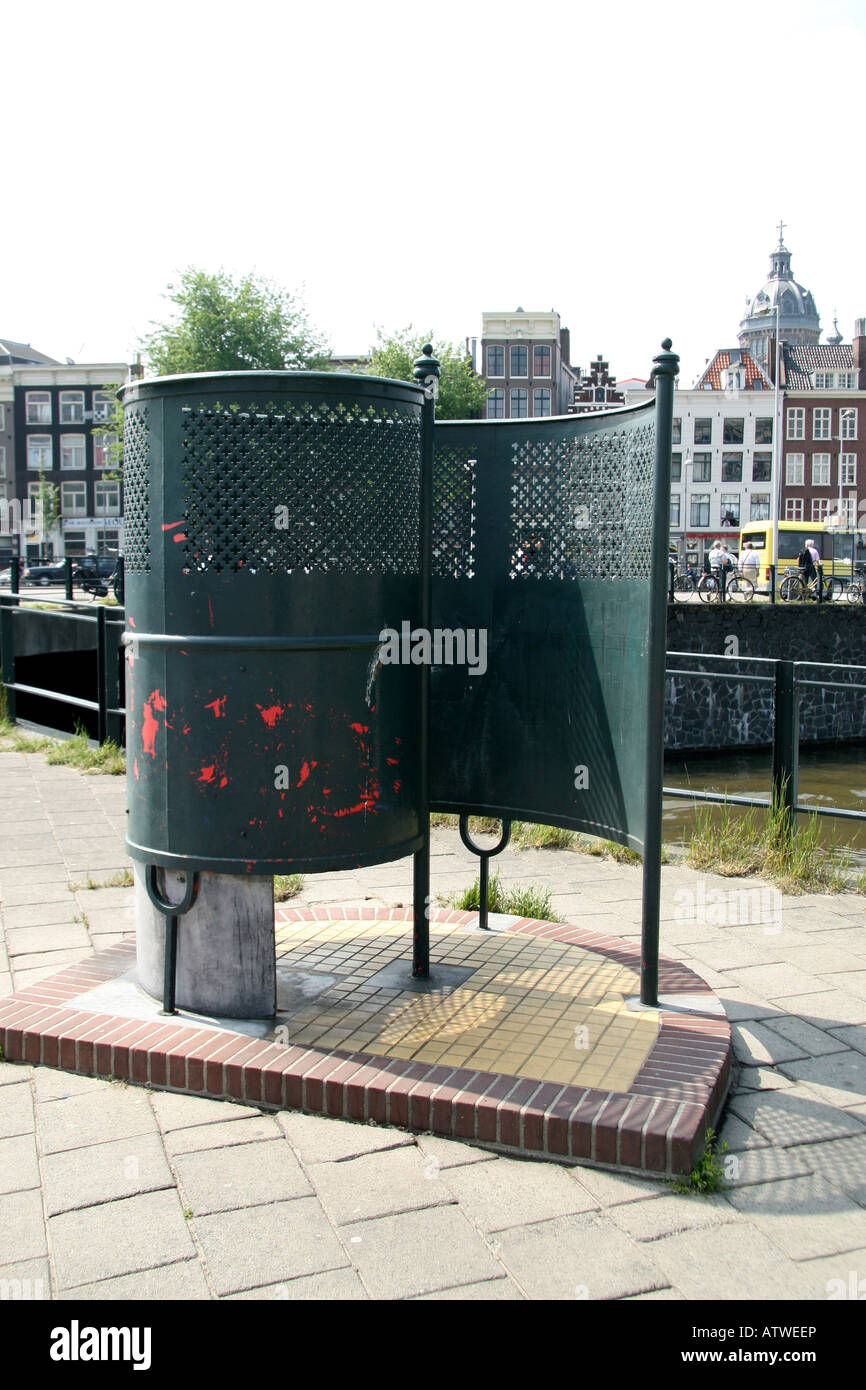 A men's urinal in Amsterdam, Netherlands. Stock Photo