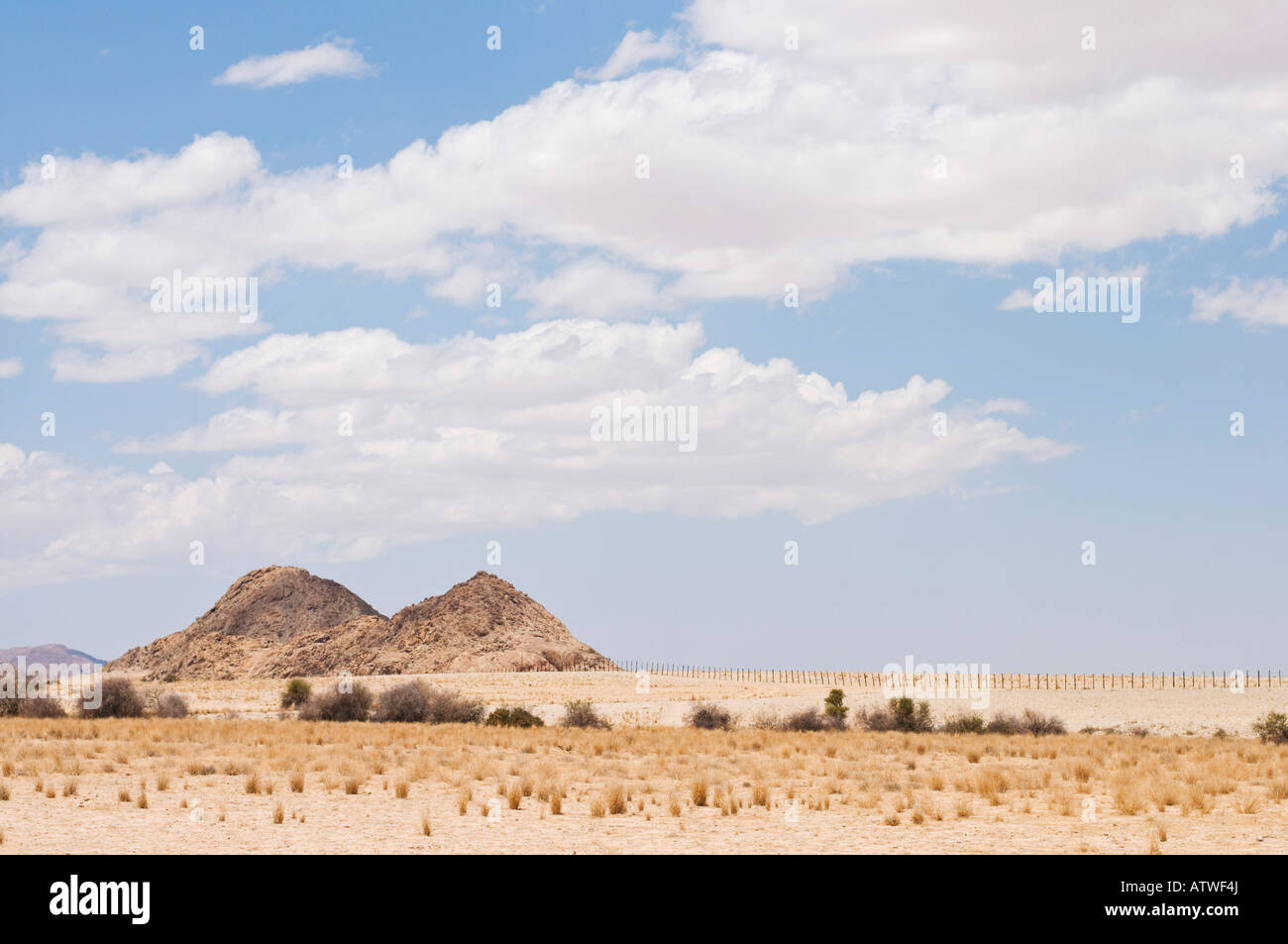 Namib Desert mountains and dry shrub in Namibia Stock Photo