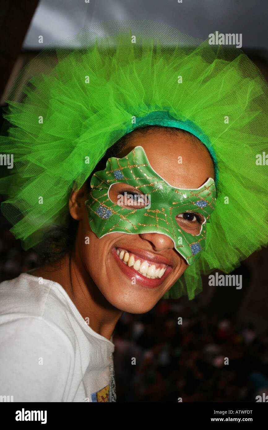 Close up portrait of beautiful woman in fancy dress costume mask and wig at Santa Teresa street bloco carnival, Rio de Janeiro Stock Photo