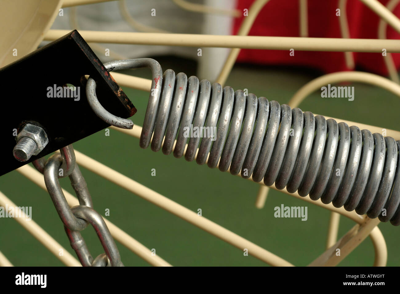 Coil tension spring on machine Stock Photo