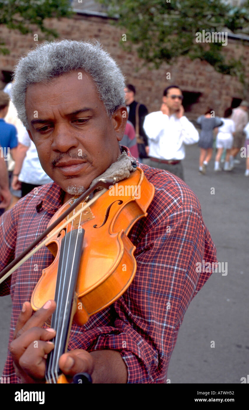 African American street musician age 55 playing violin in city park. New  York New York USA Stock Photo - Alamy