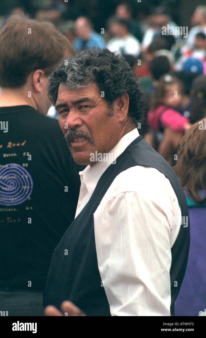 Mexican American man age 55 looking curious at Cinco de Mayo Festival. St Paul Minnesota USA Stock Photo