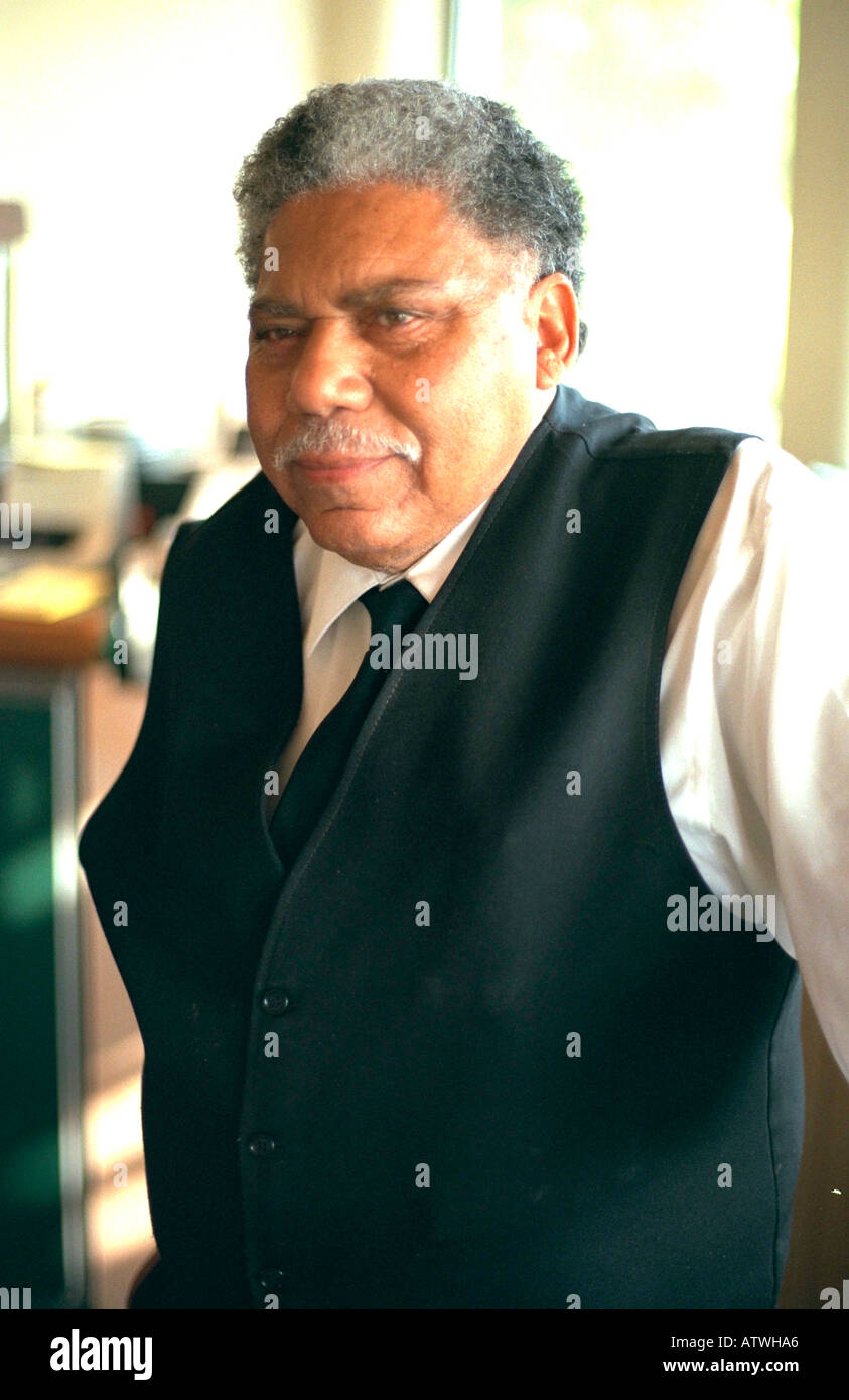 Thoughtful African American Bartender Age 60 At Wedding Reception
