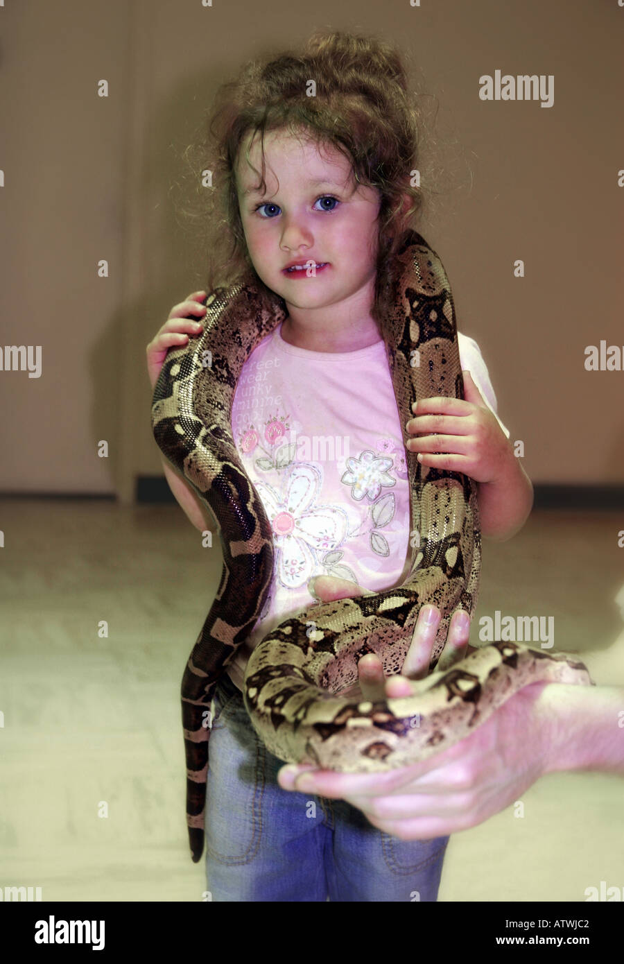Girl with snake around her hi-res stock photography and images - Alamy
