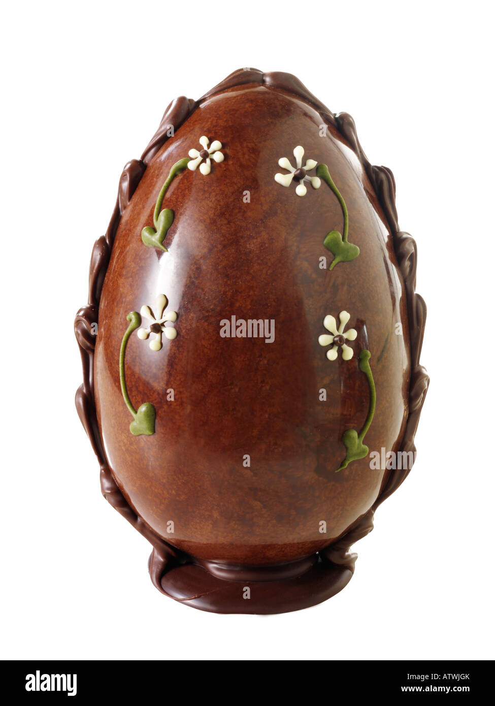 Traditional hand made decorated chocolate Easter eggs against a white background for a cut out Stock Photo