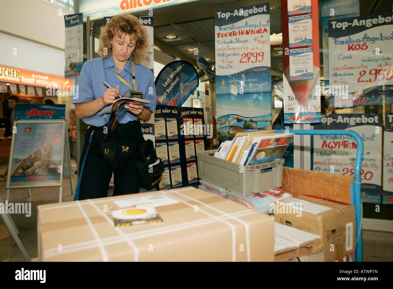 Claudia Kuhn delivers packages to Stuttgart airport Stock Photo
