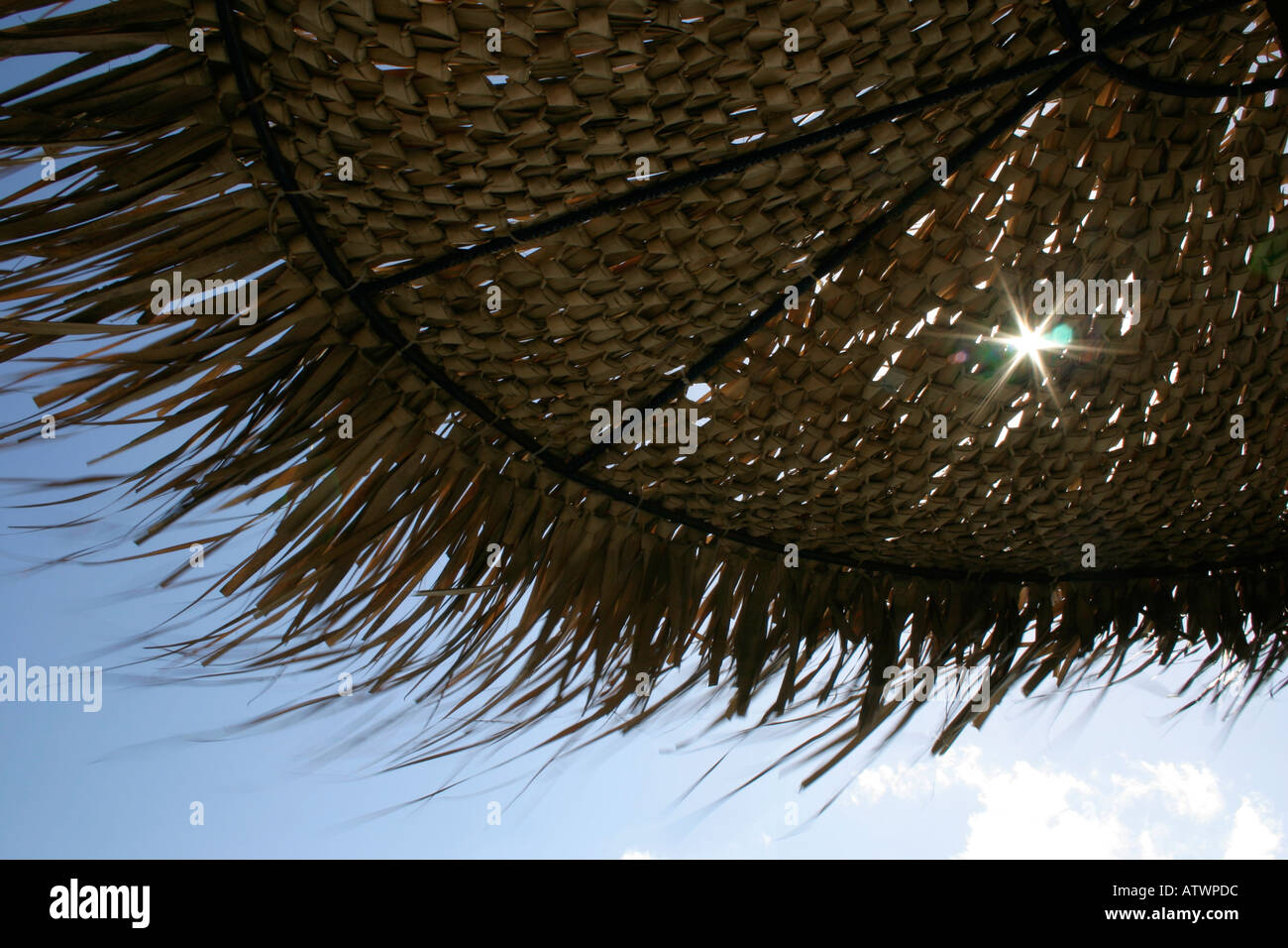 Under a Greek parasol Stock Photo Alamy