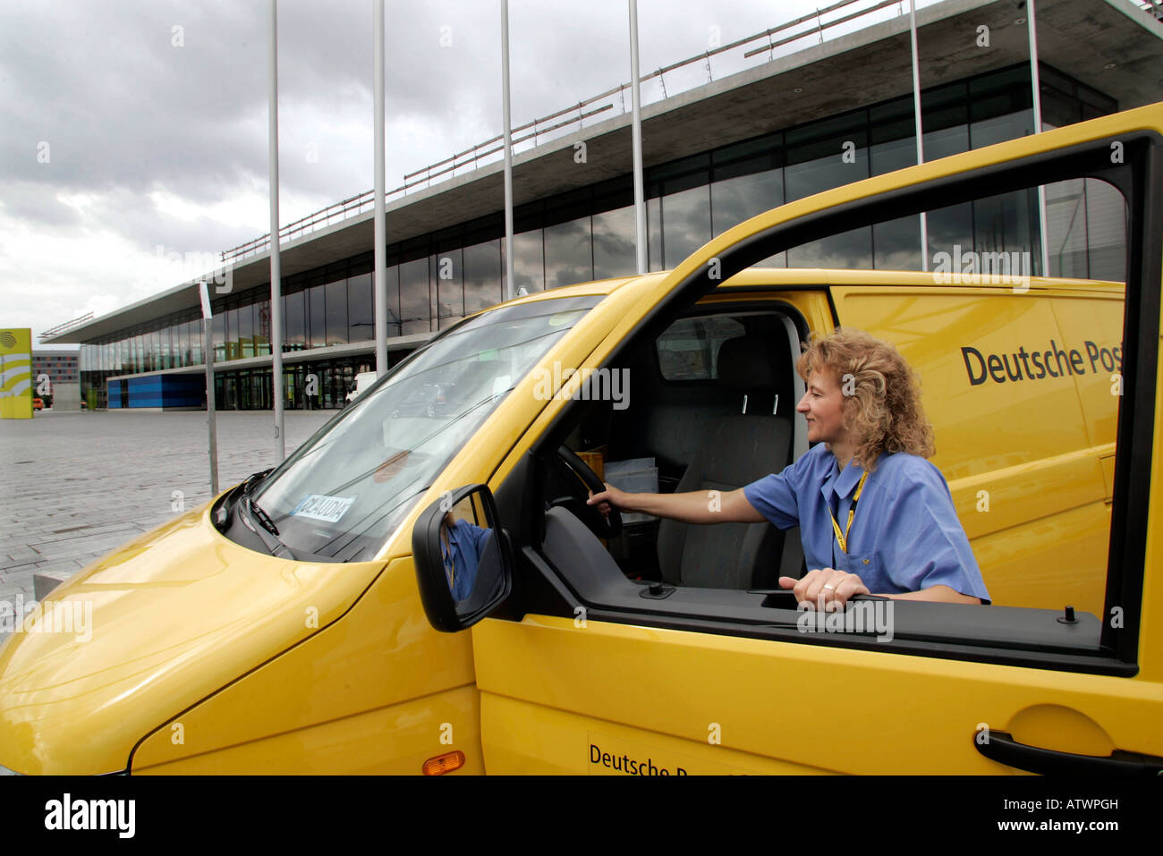 Claudia Kuhn delivers packages to Stuttgart airport Stock Photo