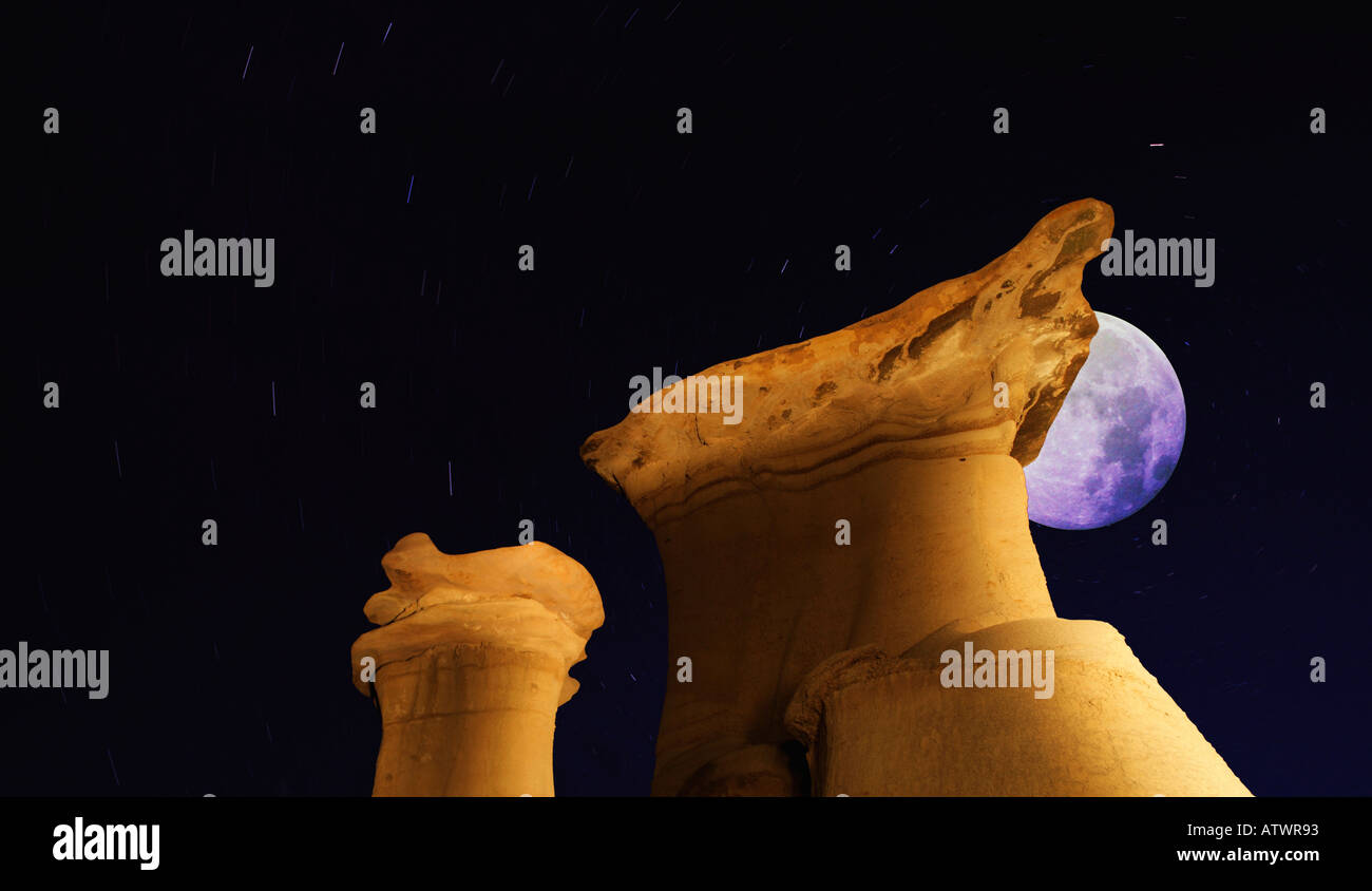Strange rock formations and moon Stock Photo