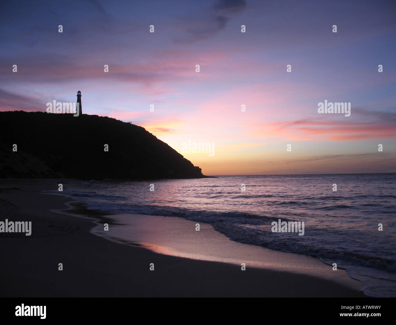 Sunset over Pedro Gonzalez Valley with lighthouse view, Margarita Island, Venezuela Stock Photo