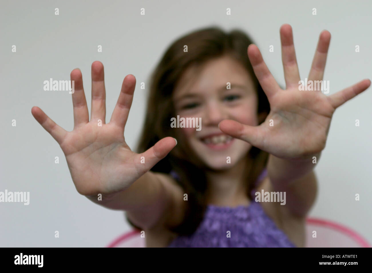 Young girl being playful Stock Photo Alamy