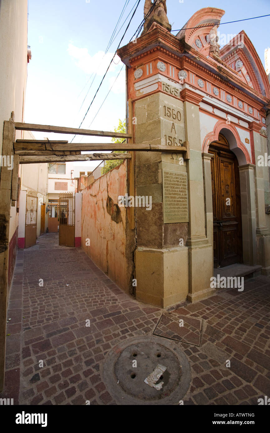 MEXICO Guanajuato Historic building braced with wooden supports carved wooden door and entrance UNESCO World Heritage Site Stock Photo