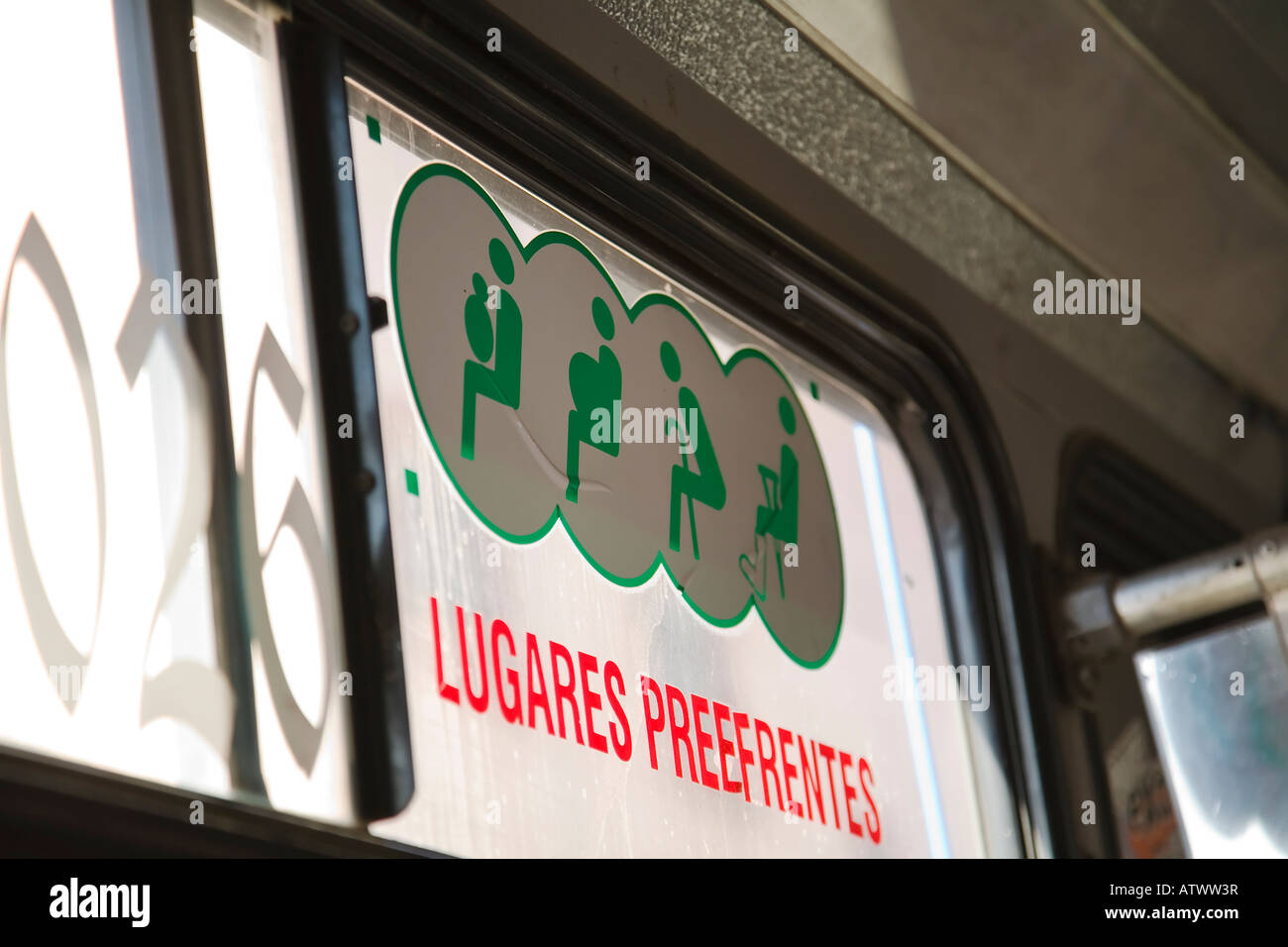 MEXICO Guanajuato Graphic symbols for preferred bus seating pregnant elderly handicapped and people with children in Spanish Stock Photo