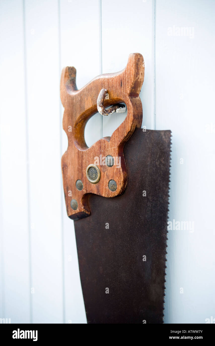 Vintage Saw hanging in a shed Stock Photo