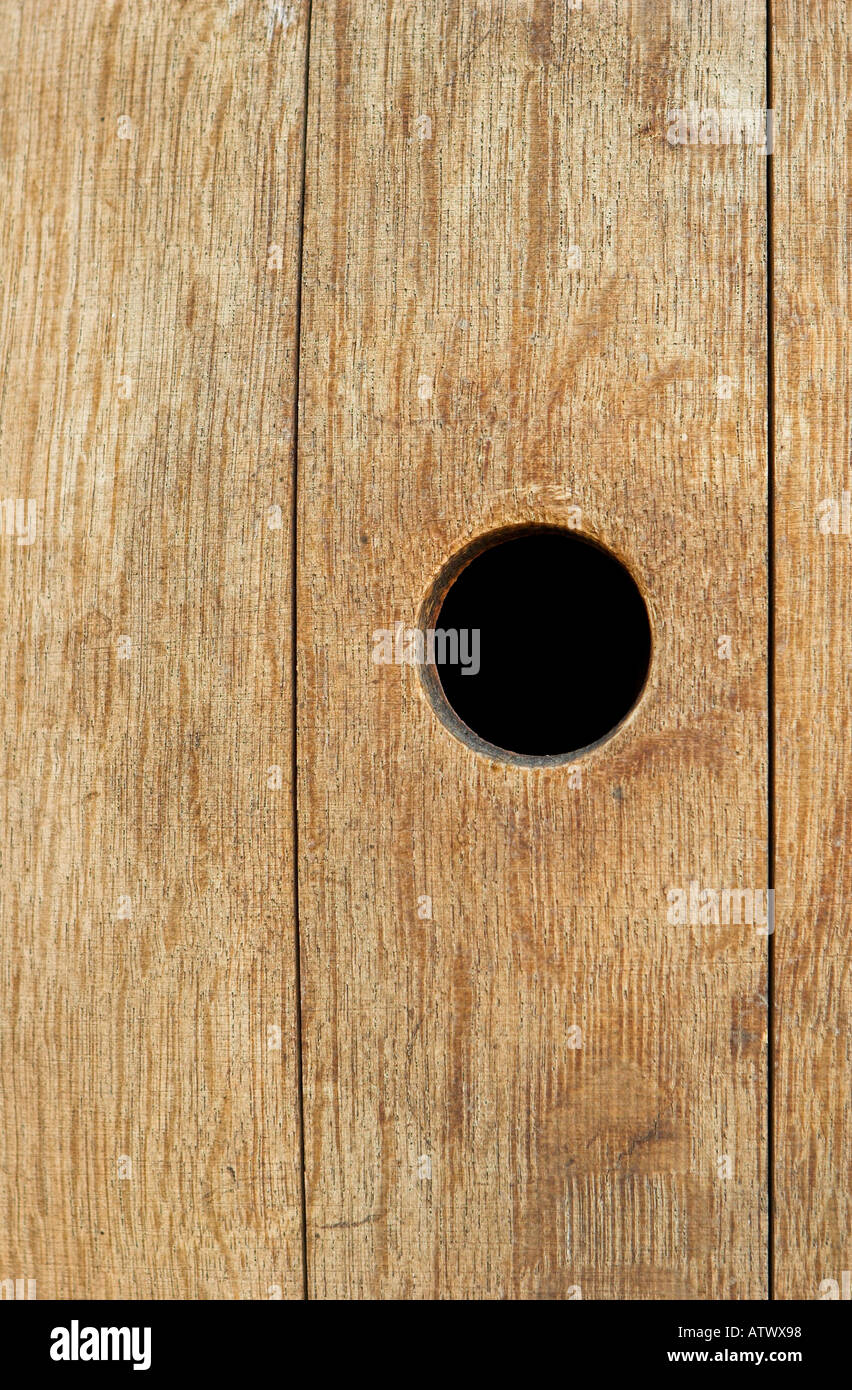Closeup view of the bung hole in a wine barrel Stock Photo