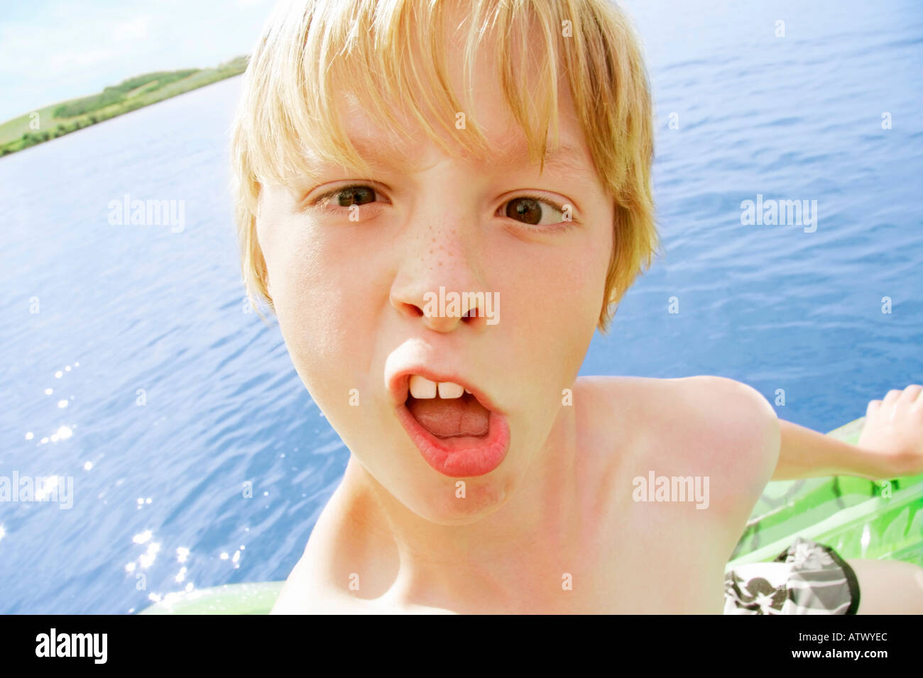 A young boy making a funny face Stock Photo