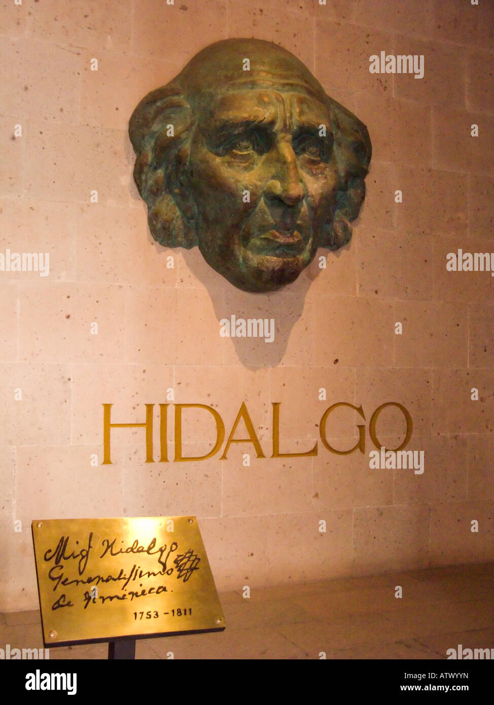 MEXICO Guanajuato Bronze face of Miguel Hidalgo on wall father of Mexican independence movement Alhondiga de Granaditas museum Stock Photo