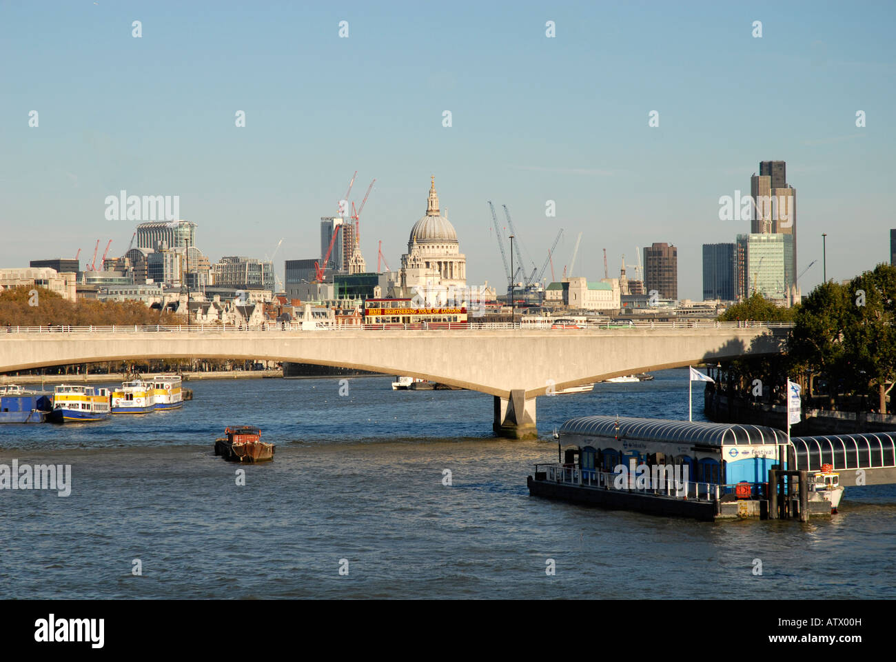 View Across Waterloo Bridge to the financial Centre of London The City with St Pauls Cathedral and The Natwest Tower 42 London Stock Photo