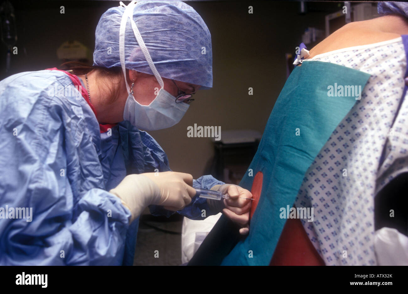 Epidural being given to a woman for pain relief during childbirth Queen