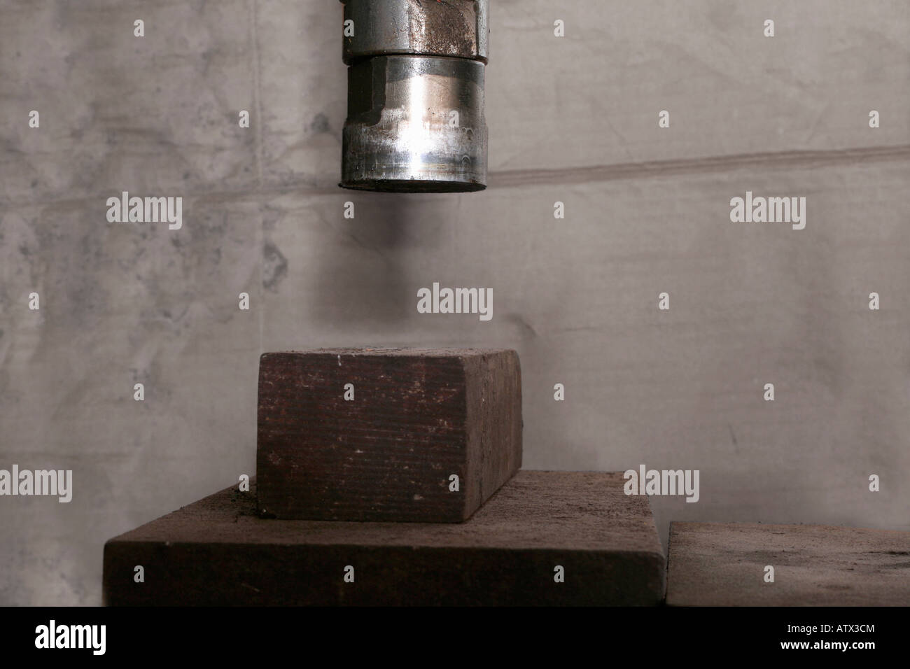 Hydraulic press ram in machine shop Stock Photo Alamy
